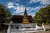 Luang Prabang, Laos - Wat Sop, the temple lay in a nice gardened area with a  that  decorated with small coloured tiles.